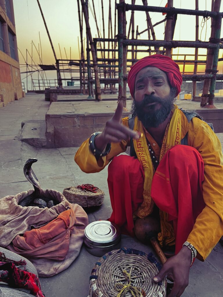 snake charmer Varanasi